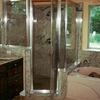 Full slab shower walls that match the vanity tops and tub deck. Very nice.