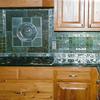 Along witht the granite tops we also added the detial all through the backsplash with metal designs.